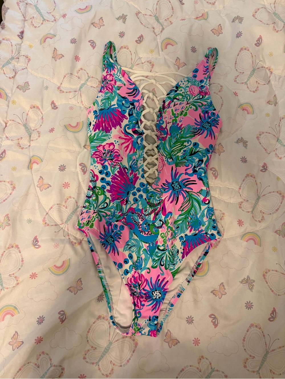 WomanOne-Piece Swimsuit in Pink Tropical Floral with Lace-Up Front